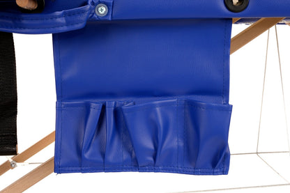 Masa de masaj pliabila idealSTORE, 2 segmente, Inaltime reglabila 62-84 cm, Piele ecologica moale, 2 cotiere laterale, Structura din lemn, Sarcina 250 KG, Rezistenta la uleiuri si apa, Include geanta de transport cadou, Albastru