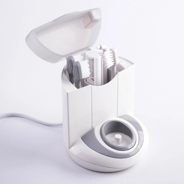 Periuta de dinti electrica IdealStore, 40.000 rotatii/min, lampa UV pentru curatarea capetelor rotative dupa utilizare, incarcare prin inductie, 3 programe de functionare, 5 capete incluse si statie de incarcare cu spatiu de depozitare a accesoriilor