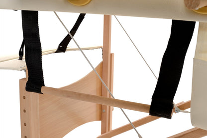 Masa de masaj pliabila idealSTORE, 4 segmente, Inaltime reglabila 59-85 cm, Piele ecologica moale, 2 cotiere laterale, Cotiera in fata, Structura din lemn, Sarcina 250 KG, Rezistenta la uleiuri si apa, Include geanta de transport cadou