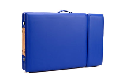 Masa de masaj pliabila idealSTORE, 4 segmente, Inaltime reglabila 59-85 cm, Piele ecologica moale, 2 cotiere laterale, Tetiera, Structura din lemn, Sarcina 250 KG, Rezistenta la uleiuri si apa, Include geanta de transport cadou, Culoare Albastra