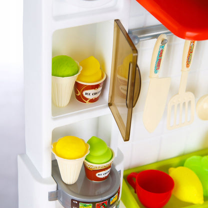 Bucatarie MULTIFUNCTIONALA IDL Candy Pink, 95 CM Inaltime, Efecte luminoase si sonore, Dotata cu accesorii simbolice: aragaz, frigider, cuptor, vesela, produse alimentare, Maro