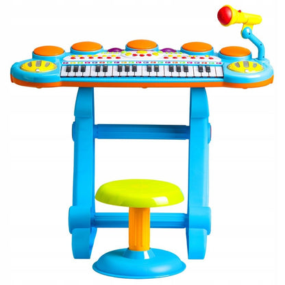 Orga cu Microfon si Scaunel idealSTORE, Glamour Piano, Dimensiuni 45 x 60 x 25 cm, Echipata cu 37 taste functionale, Lumini colorate, Dezvolta dexteritatea manuala, Albastra-Galben