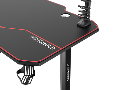 Birou Gaming cu suprafata tip mousepad idealSTORE Shark GD HOLD, Dimensiuni 140 x 66 x 77 cm, Prevazut cu picioare stabile, Accesorizat cu suport pentru casti, pahar si mousepad, Echipat cu orificii speciale pentru cabluri, Negru-Rosu