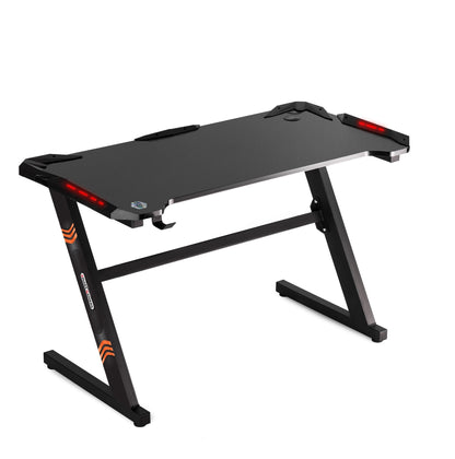 Birou gaming Smart Collection idealSTORE Dimensiuni 120 x 60 x 70 cm, Cadru metalic stabil, Iluminare LED, Accesorizat cu suport pentru casti, Picioare reglabile, Echipat cu sistem de gestionare a cablurilor, Culoare Negru