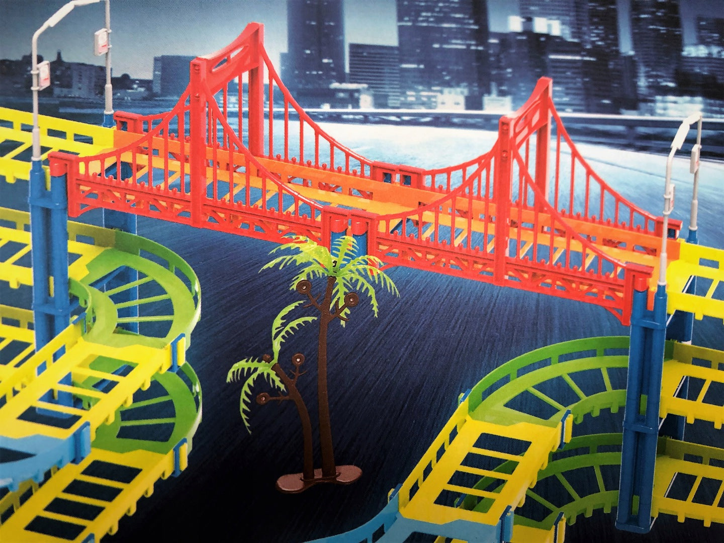 Set pista auto cu doua masinute idealStore CITY GLOW, Contine un total de 169 de piese colorate incluzand doua masinute iluminate LED, Setul flexibil permite dezvoltarea imaginatie si ablitatile practice