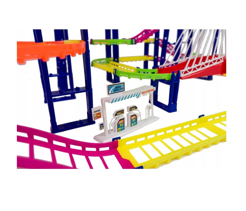 Set pista cu 2 masinute URBAN RAIL idealSTORE, Dimensiuni 30,5 x 87 x 43 cm, Include 193 de elemente, benzinarie, Dezvolta abilitati manuale si stimuleaza imaginatia copiilor