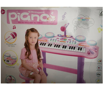Orga interactiva electronica THE LITTLE SINGER, Dimensiuni 64 x 45 x 20, Include, tastatura, suport orga, microfon, suport pentru microfon, scaun, efecte de lumini, butonul de inregistrare si redare