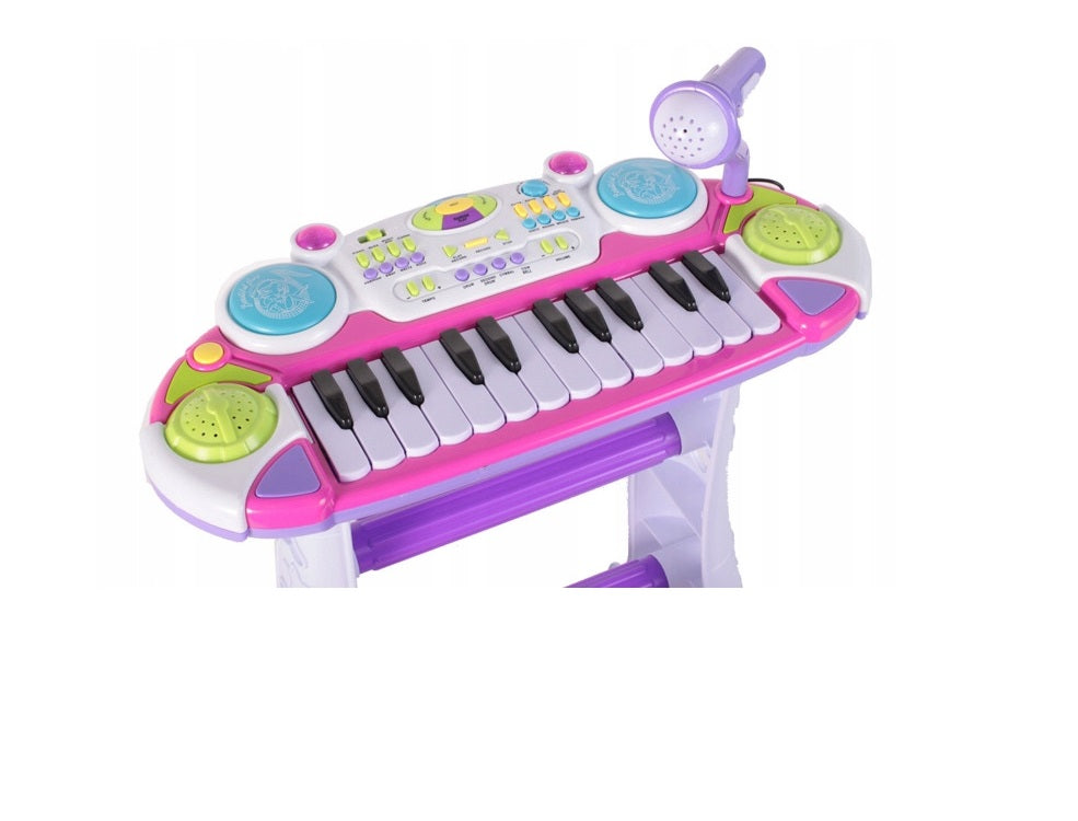 Orga Interactiva electronica IDL Mica Artista cu Scaunel si Microfon model 2019, Dimensiune 45,0 x 20,0 cm, Orga cu 24 Clape Silentioase, 16 Tipuri de melodii, Lumini Colorate, Buton pentru inregistrare si redare, materiale calitative,Culoare Roz