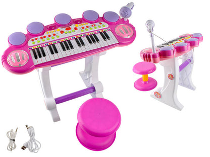 Centru de activitati Maestra Pianista cu Orga, Microfon, Scaunel, Melodii si Luminite, Difuzor incorporat, Dimensiuni 60 cm latime, 47 cm inaltime, Picioruse Antiderapante, Culoare Roz