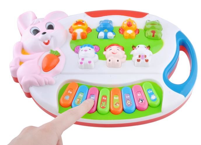 Centru de activitati Micul Pianist Iepuras cu Melodii si Luminite, Difuzor incorporat, Dimensiuni 24.5 cm lungime, 18 cm latime, Culoare Alb