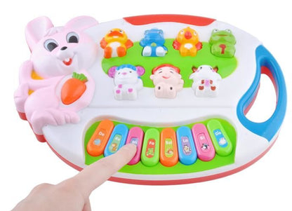 Centru de activitati Micul Pianist Iepuras cu Melodii si Luminite, Difuzor incorporat, Dimensiuni 24.5 cm lungime, 18 cm latime, Culoare Alb