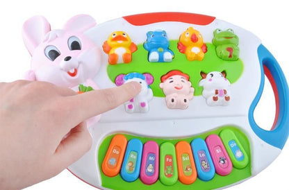 Centru de activitati Micul Pianist Iepuras cu Melodii si Luminite, Difuzor incorporat, Dimensiuni 24.5 cm lungime, 18 cm latime, Culoare Alb