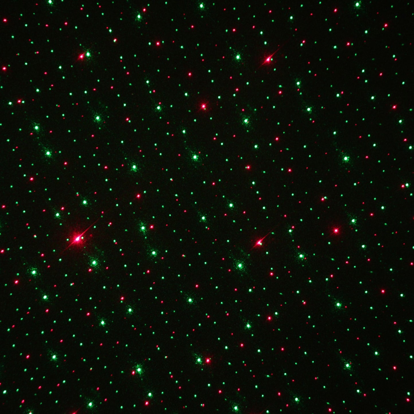 Instalatie Craciun IDL Laser Shower cu telecomanda si microfon pentru iluminarea interioara a locuintei, Efecte multiple, Proiectii de imagini si jocuri de lumini bicolore alaturi de set 12 fundite rosii pentru decorarea bradului